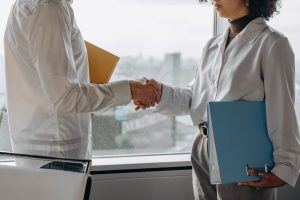 A person hiring someone in an office.
